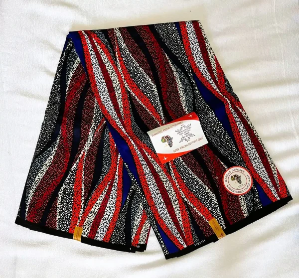 African wax print fabric with bold red, white, and blue wave patterns interlaced with intricate black and white dots, made from durable cotton.
