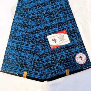 Premium Ankara/Kitenge fabric featuring bold abstract patterns in blue and black on a durable cotton base.