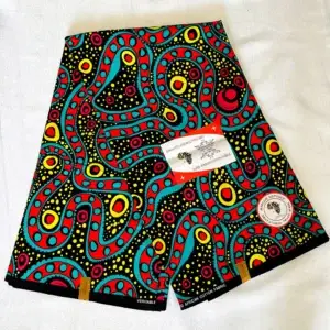 Premium Ankara/Kitenge fabric featuring swirling shapes in turquoise, red, and yellow with intricate dots, crafted from durable cotton.