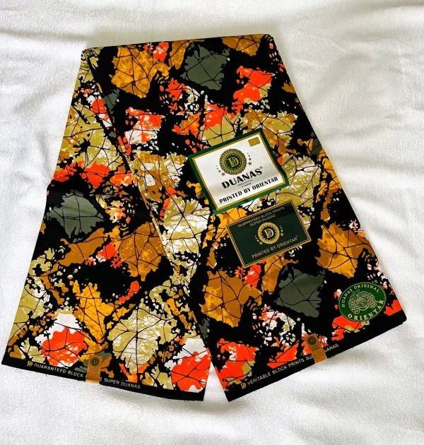Premium Cotton Kitenge fabric with colorful orange, yellow, green, and white leaf patterns on black cotton.