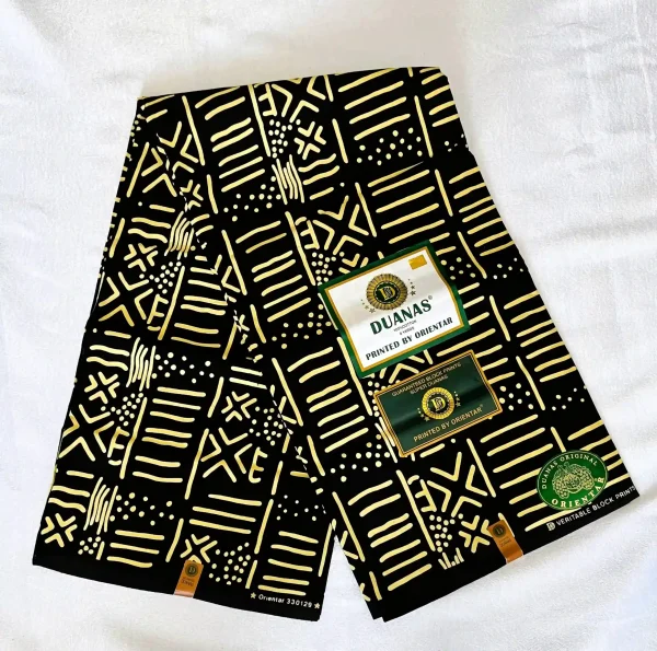 Premium Cotton Kitenge fabric featuring beige geometric patterns and circular accents on a black backdrop, crafted from durable African cotton.
